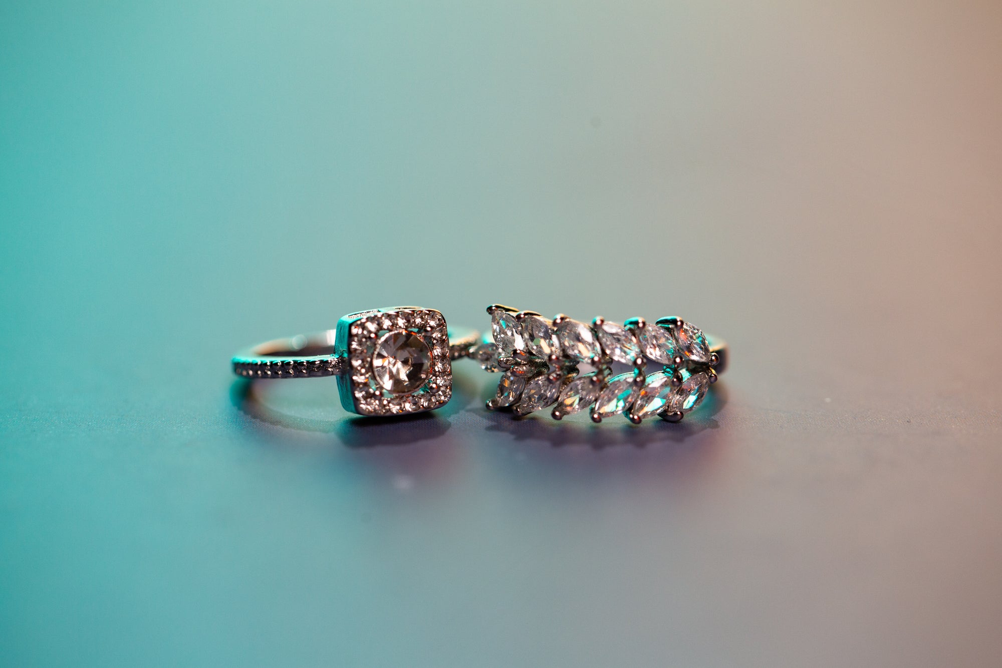 Model wearing bracelet and blouse — complete-the-look styling image with interactive hotspots.